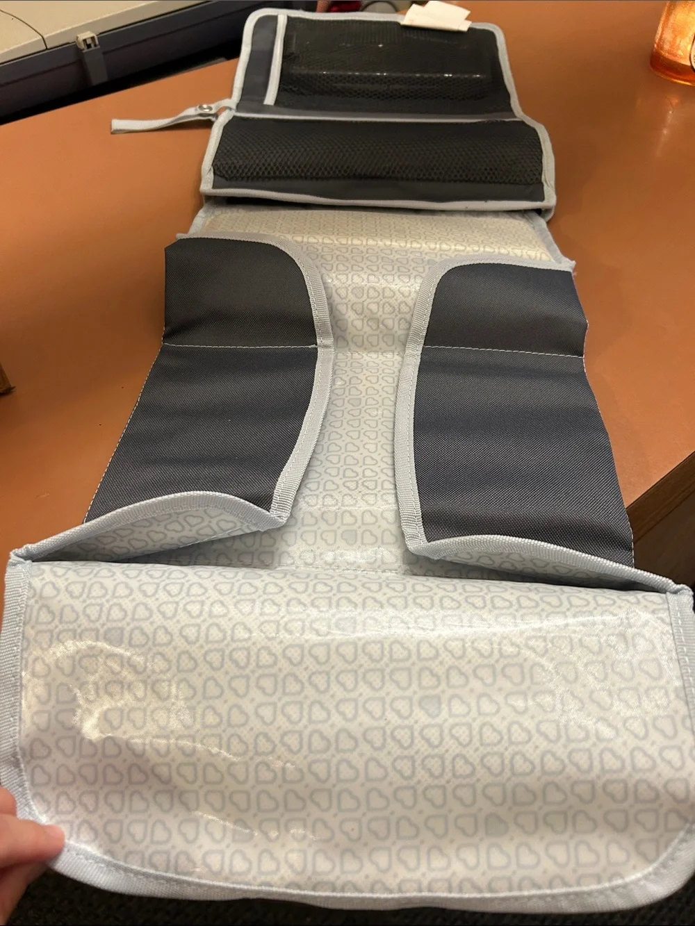 Compact Diaper Holder with Changing Pad. Quick for on the go!
